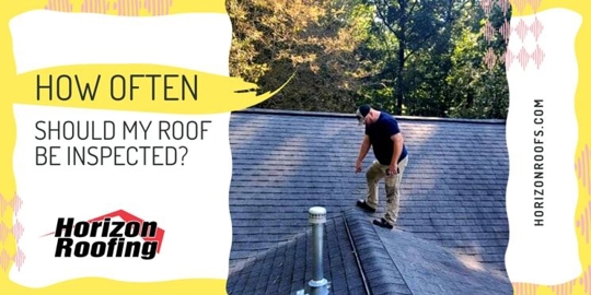 Man working on a house roof