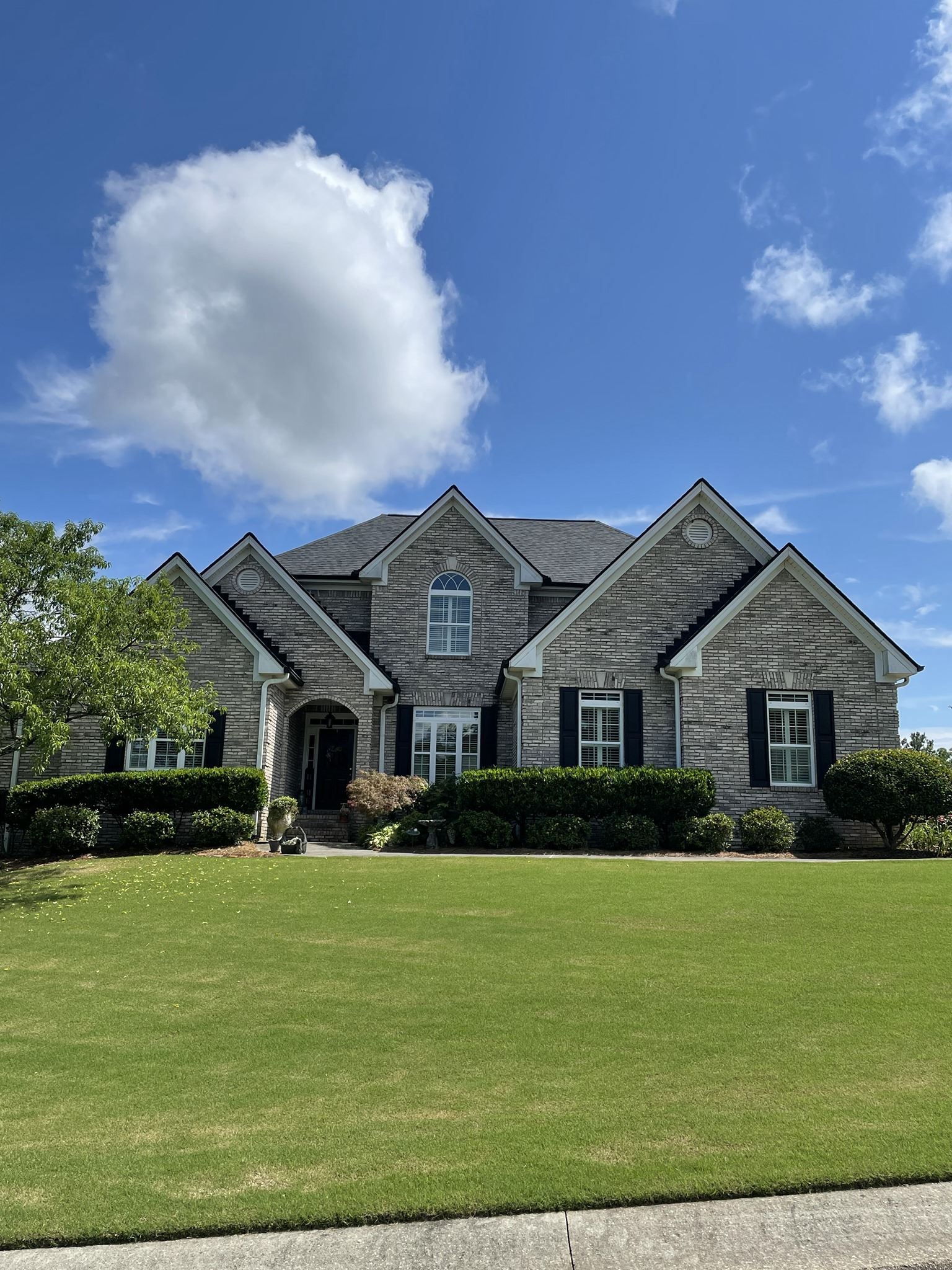 Brick home with a new architectural shingle roof